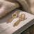 Golden Orbit Tassel Earrings