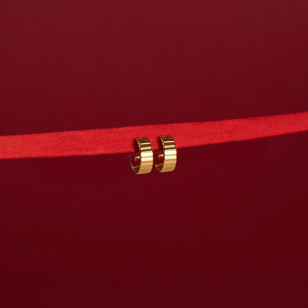 Infinity Huggie Earrings